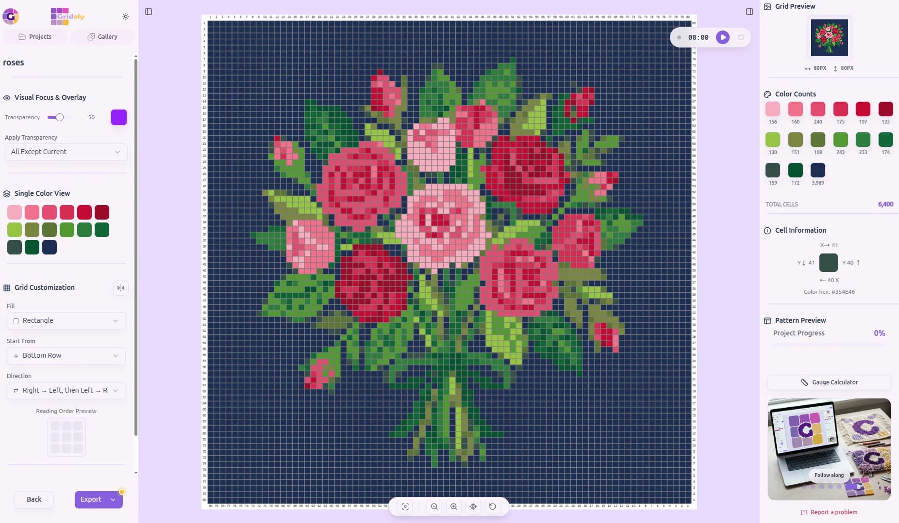 A needlepoint chart of a bouquet of red and pink roses on a navy background